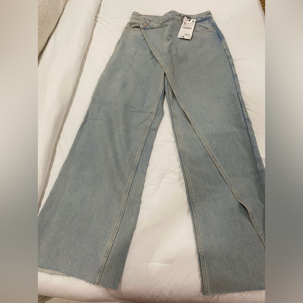 Brand new wrapped jeans. ZARA. New. Never worn. Tags on.